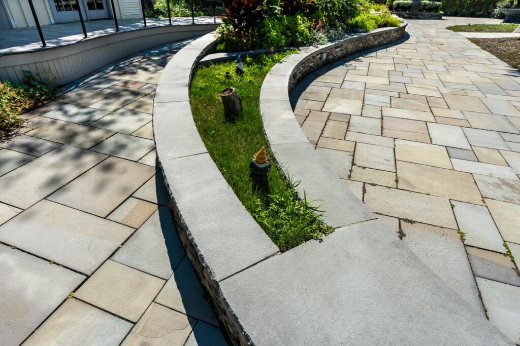 Which way to go. Aura Natural Landscape stone and coordinating coping are a match made in heaven for your hardscapes. 