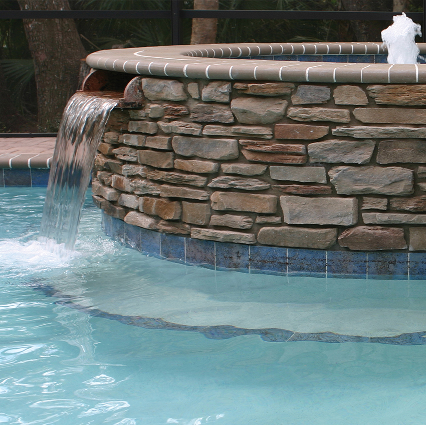 Dutch Quality Stone plays beautifully alongside this water feature.