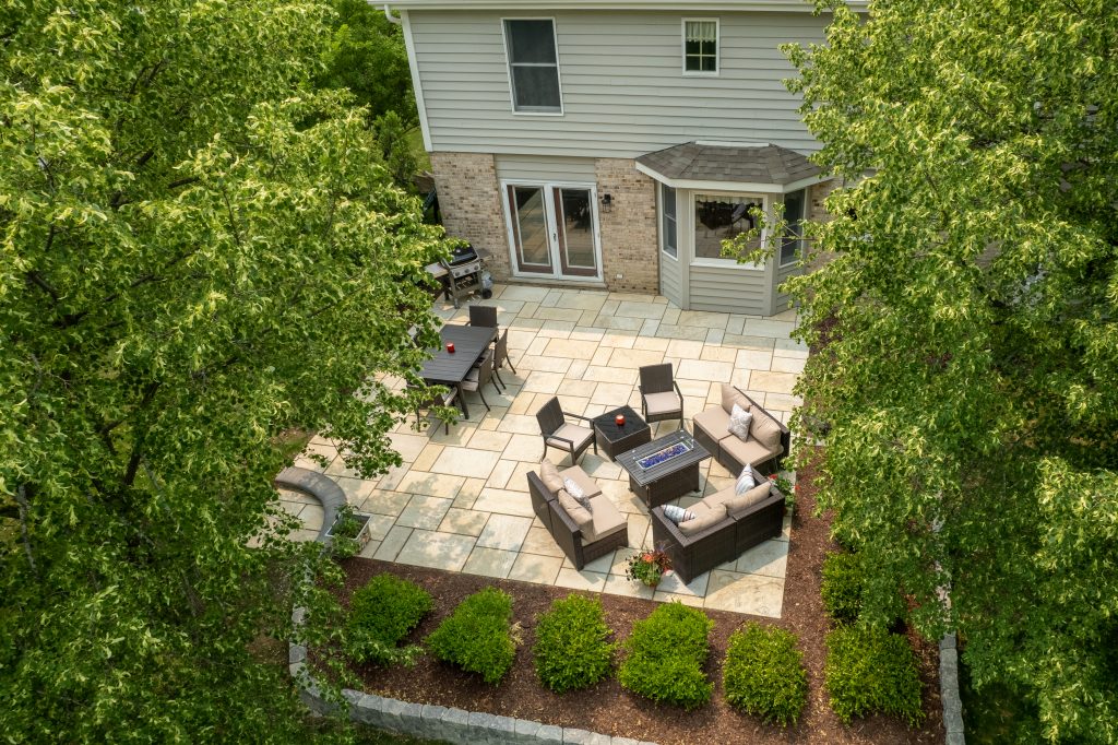 See the patio where Aura sandy point pavers replaced concrete pavers